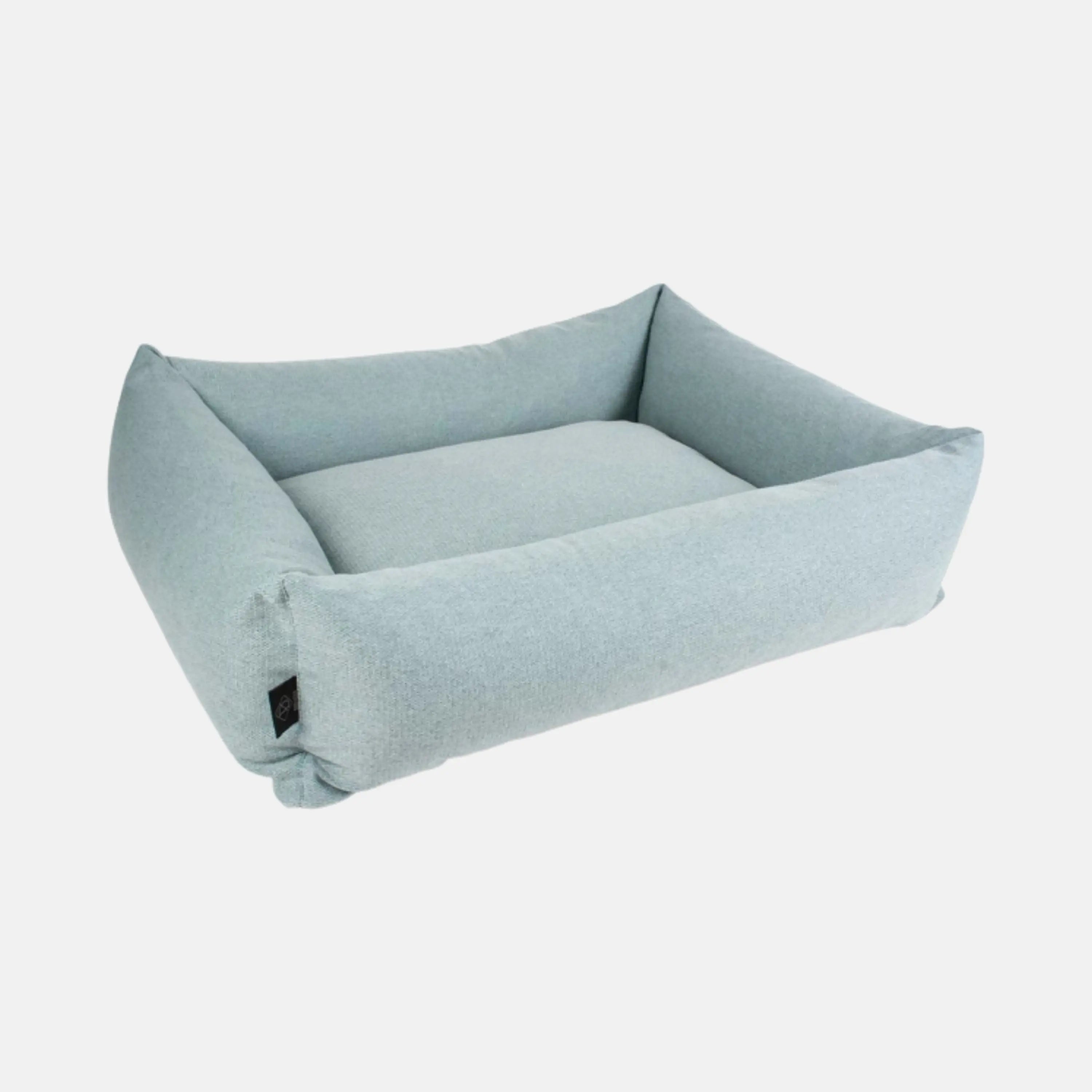 Das Zeigt das D&D Hundebett Eden in der Farbe Blau aus der Schrägansicht.