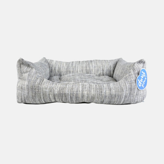 Das Bild zeigt das Duvo Hundebett Cliff in der Farbe Grau aus der Seitenansicht.