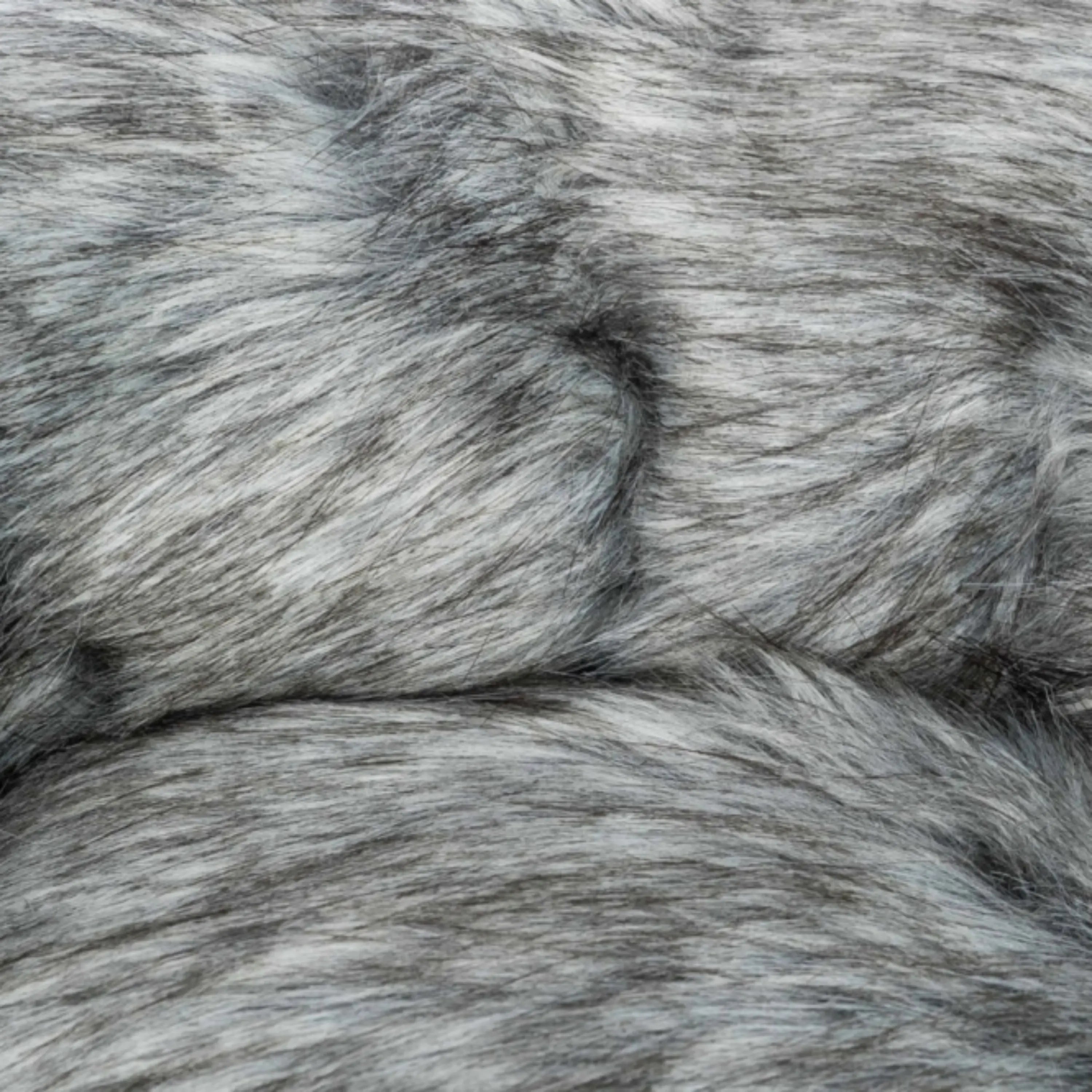 Das Bild zeigt eine Nahaufnahme von dem Material für Trixie Bett Yelina in der Farbe Schwarz/Grau.